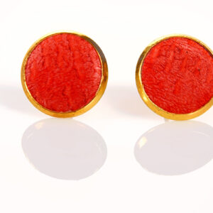 Puces d'oreilles rouge dorée